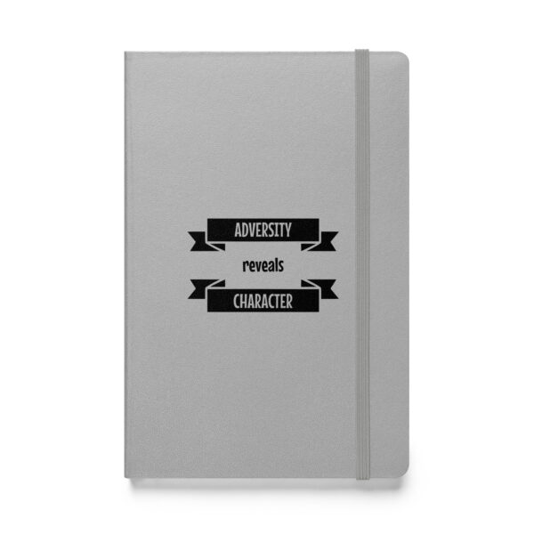 Adversity reveals character. (Hardcover Notebook)